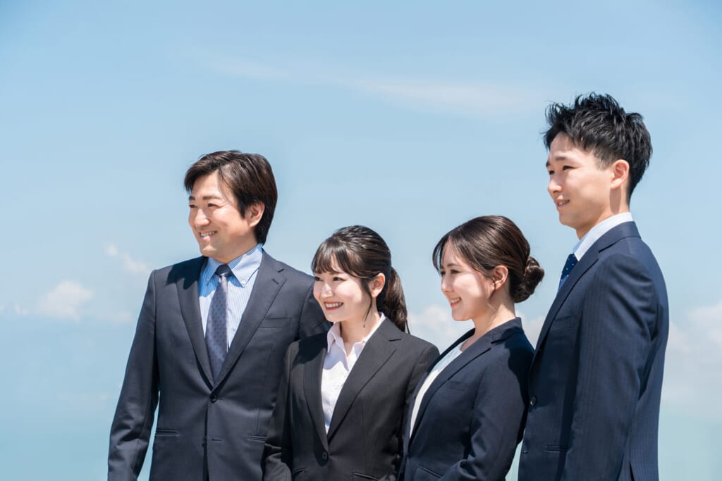 Company workers dressed in suits