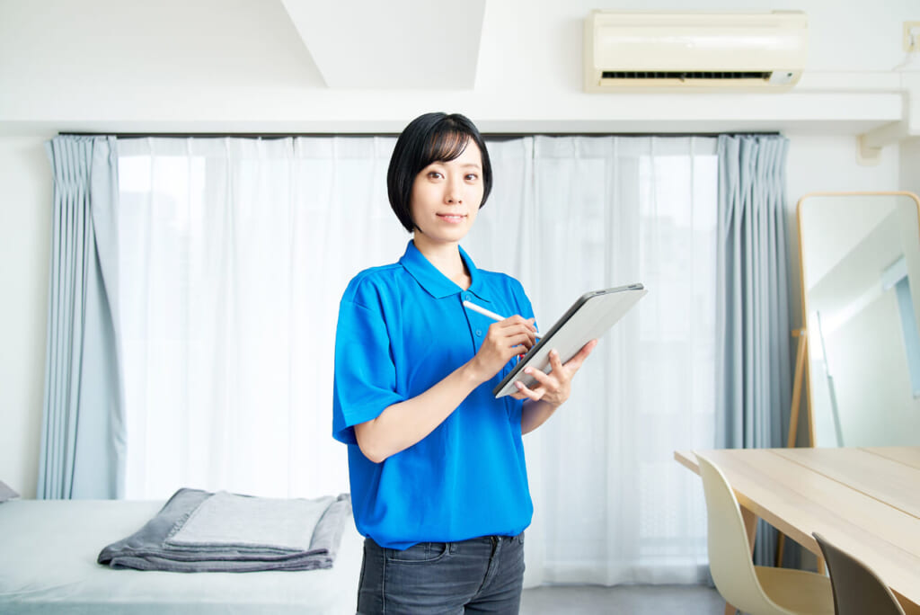 Woman managing an apartment